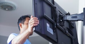 What Tradesman Puts a TV on the Wall
